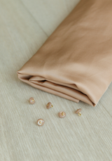 Bouton à coudre en nacre Wink Glossy 10 mm - Plusieurs couleurs