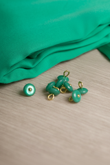 Bouton à coudre en nacre Wink Glossy 10 mm - Plusieurs couleurs