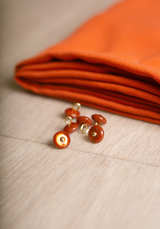 Bouton à coudre en nacre Wink Glossy 10 mm - Plusieurs couleurs