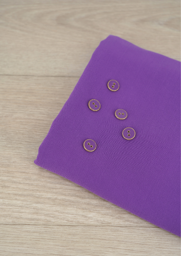 Bouton Ultra Violet à paillettes dorées 12 mm